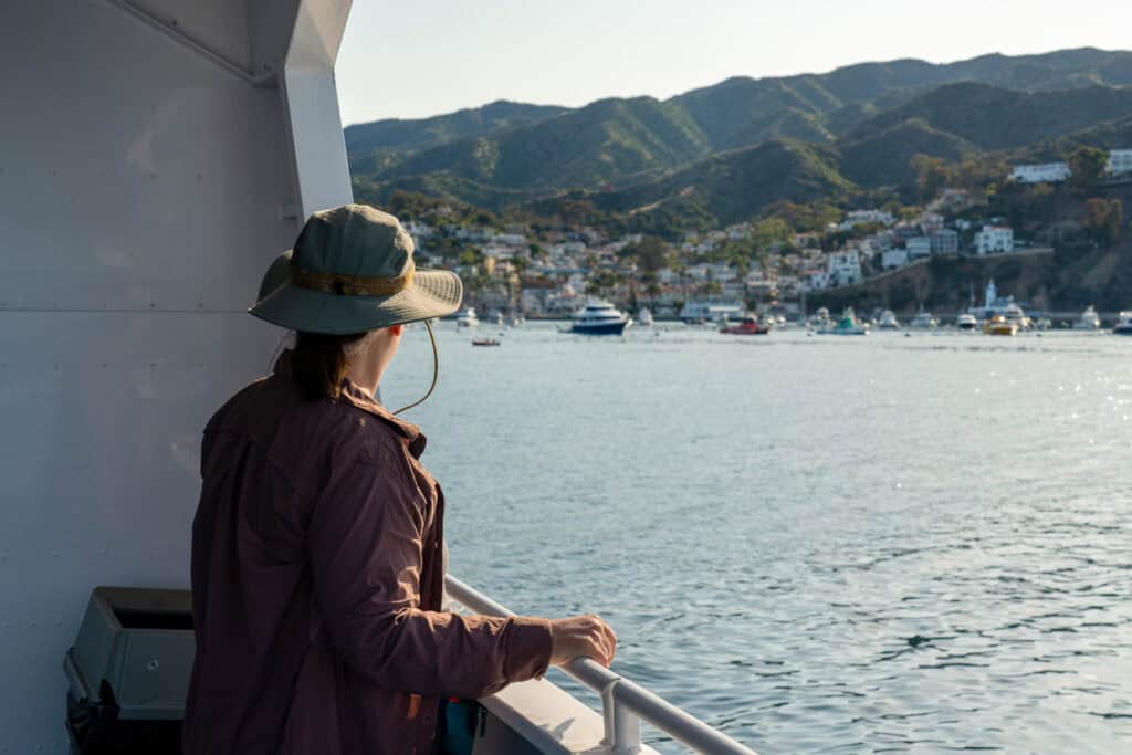Hiker on the ferry approaching Catalina Island