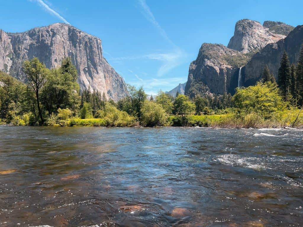 El Capitan and Bridalveil Fall with the Merced River flowing in the foreground.